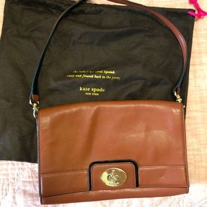 Kate Spade brown leather purse, striped interior. Gently used.